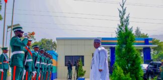 Honourable Minister, Ministry of Defence Mohammed Badaru Abubakar CON mni inspecting Quarter Guard in Army War College, Abuja.