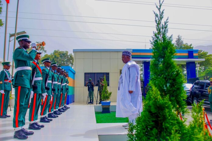 Quarter Guard in Army War College Honourable Minister, Ministry of Defence Mohammed Badaru Abubakar CON mni inspecting Quarter Guard in Army War College, Abuja.