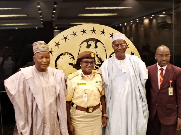 Hon Minister Housing and Urban Development, Arc Ahmed Dangiwa and Acting Controptroller of Nigerian Immigration Service, Caroline Wura-Ola Adipose, Minister of State , Housing and Urban Development, Abdullahi Tijjani Gwarzo (L) and Permanent Secretary, Works and Housing, Mamuda Manmsn (R)