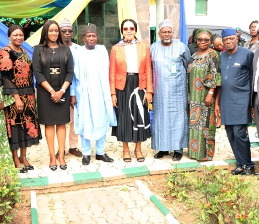 Hon. Minister of Labour and Employment, Simon Bako Lalong, CON (6th left); Hon. Minister of State, Labour and Employment, Nkeiruka Onyejeocha, OON (6th right); Director Overseeing the Office of the Permanent Secretary, Juliana Adebambo (4th left); MD Nigeria Social Insurance Trust Fund (NSITF), Mrs Maureen Alagoa (5th left) with the Directors of the ministry and Management Staff of NSITF, during the familiarisation visit to the Fund, in Abuja