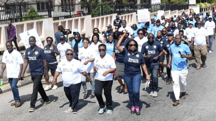 Flag off-awareness walk Front Row: Representative of Solicitor General of the Federation and Permanent Secretary, Federal Ministry of Justice, Mrs. Gladys Odegbaro (2ND R); Flanked by Director Human Resources Department, Mrs. Foluke Oni (3RD R) and Head, Cybercrime Unit of the Ministry, Mrs. Jamila Akaaga Ade ( 1ST R )and a Cross Section of Stakeholders and staff of the Ministry during the Flag off/awareness walk in Abuja on Tuesday November 7TH, 2023.