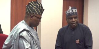 (R-L) Perm Sec Ecological Project Office, Malam Shehu Ibrahim, presenting a copy of the Compendium to the Senate President, Senator Godswill Obot Akpabio