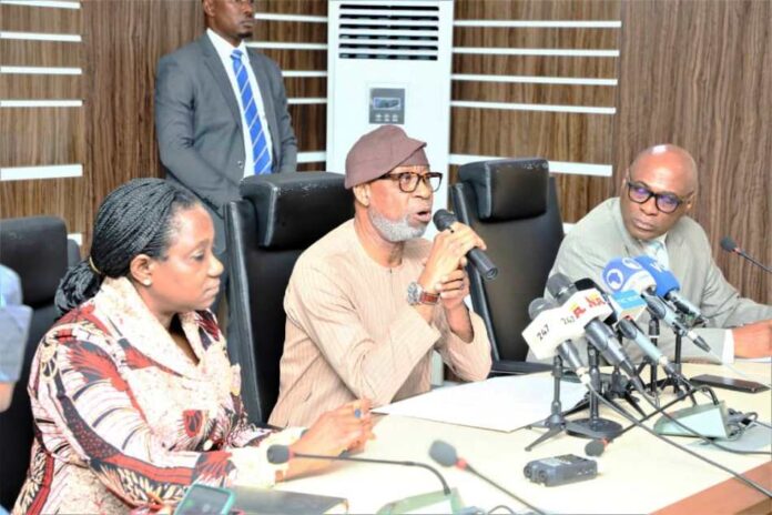 Mineral Titles Middle: The Minister for Solid Minerals Development, Dr Oladele Alake addressing a Press Conference on the Revocation of Defaulting 1,633 Mineral Titles: Left: Dr. Mary Ogbe, Permanent Secretary, Ministry of Solid Minerals Development/ Steel Development; Right: Mr Ime Ekrikpo, Director Investment Promotion & Mineral Trade ( IPMT) Department in the Ministry.