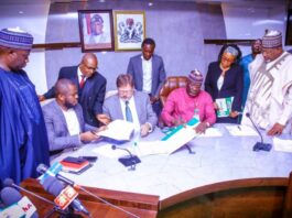 L-R, the Minister of State, Agriculture and Food Security, Dr. Aliyu Abdullahi, Country Director, John Deere Engr. Chijoke Okoli, Vice President, John Deere, Jason Braintley, Permanent Secretary, FMAFS, Dr. Ernest Umakhihe and Minister Of Agriculture and Food Security, Sen. Abubakar Kyari, during the Signing of the Memorandum of Understanding in Abuja.