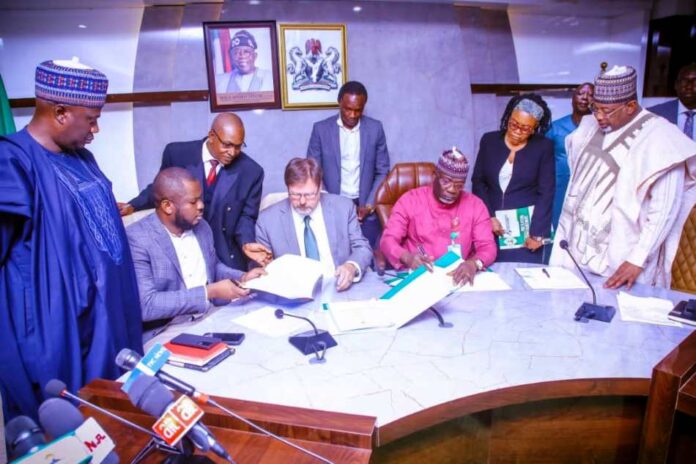L-R, the Minister of State, Agriculture and Food Security, Dr. Aliyu Abdullahi, Country Director, John Deere Engr. Chijoke Okoli, Vice President, John Deere, Jason Braintley, Permanent Secretary, FMAFS, Dr. Ernest Umakhihe and Minister Of Agriculture and Food Security, Sen. Abubakar Kyari, during the Signing of the Memorandum of Understanding in Abuja.