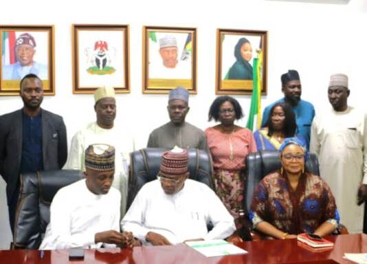 L-R: Resident Representative of the United Nations Development Programme (UNDP) Mohàmmed Yahaya, Minister of Police Affairs, Senator Ibrahim Gaidam, Minister of State, Hajia Imaan Sulaiman-Ibrahim and others during a courtesy visit by the United Nations Development Programme (UNDP) team to the Headquarters of the Ministry in Abuja.
