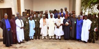 Minister of Defence, Muhammad Badaru Abubakar, Minister of Defence for State, Dr Muhammad Bello Matawalle, Ministry's Permanent Secretary, Dr Ibrahim Abubakar Kana, management staff of the Ministry and Veterans in a group picture in Ship House, Abuja