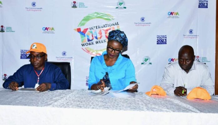 Youth Ministry Middle, Hon. Minister of Youth Development, Dr. Jamila Bio Ibrahim, 1st right, representative of the Permanent Secretary and Director Enterprise Development and Promotion FMYD, Mr. Olugbenga Momoh and 1st left, President, Nigerian Youth Workers Association, Mr. Ben Duntoye at the 2023 International Youth week celebration in Abuja, Nigeria November 9, 2023.