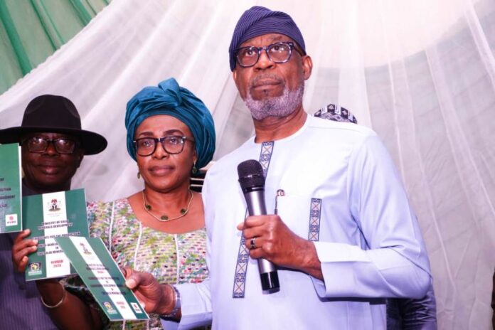 collaboration with the African Centre for Leadership R: L: The Honorable Minister of Solid Minerals Development, Dr. Dele Alake, National executive, Women in Mining, Nigeria, Ambassador, Regina Edzuwah and President, Miners Association of Nigeria Mr. Dele Ayanleke during the Unveiling of the Pamphlet, “Guidelines for the Production of Community Development Agreements (CDAs) in the Solid Mineral Sector” organized by the Ministry of Solid Minerals Development (MSMD) in collaboration with the African Centre for Leadership, Strategy & Development in Abuja, Nov. 16, 2023.
