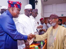 Honorable Minister of Solid Minerals Development, Dr. Dele Alake (Right) with the chairman, Senate committee on Appropriation, Senator, Solomon Olamilekan Adeola (Yayi) exchanging greetings during the Budget Defence session in NASS, Abuja.