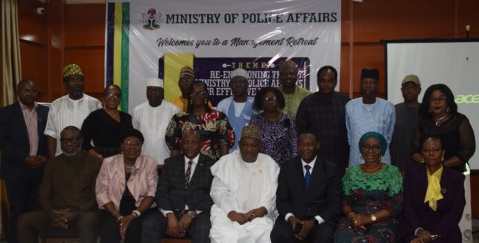 Dec 21 seated L-R: AIG Kayode Aderanti (Rtd),Director (Planning, Reseach and Statistics) Azeez Atinuke Margaret; Head (INTERPOL, National Crime Bureau), AIG Lanre Bankole; Permanent Secretary (Ministry ofPolice Affairs), Dr. Nasir Sani Gwarzo; Inspector General of Police representative, AIG Abouyari Shuayau Lafia; Director (Finance & Accounts); Bakre Juliana Modupe; Director (General Services) Edemanya Brayila Ibilola and other Directors during a 2-day retreat with the theme: Re-Envisioning the Ministry of Police Affairs for Effective Internal Security; Strengthening Administration and Management Functions for Resilience and Efficiency held in Abuja recently.