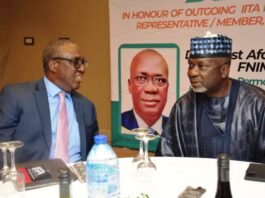 L-R, The Director General, IITA, Dr. Simeon Ehui and Permanent Secretary, Dr. Ernest Umakhihe during the Dinner in Abuja.