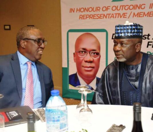 L-R, The Director General, IITA, Dr. Simeon Ehui and Permanent Secretary, Dr. Ernest Umakhihe during the Dinner in Abuja.