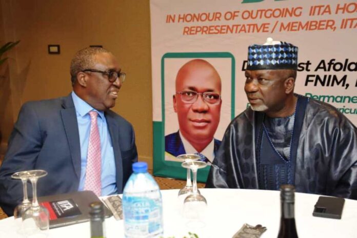 Dr. Ernest Umakhihe, Permanent Secretary L-R, The Director General, IITA, Dr. Simeon Ehui and Permanent Secretary, Dr. Ernest Umakhihe during the Dinner in Abuja.