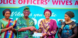 From left Wife of the Chief of Defence Staff and President DEPOWA, Mrs Oghogho Musa, a beneficiary of the RHIESS, First Lady of the Federal Republic of Nigeria, Senator Oluremi Tinubu, CON and the wife of the Deputy Senate President Mrs Benjamin Kalu as the First Lady presents One Hundred Thousand Naira to the Elderly Citizen at the Renewed Hope Initiative Elderly Support Scheme in Abuja where 250 people benefited from each state, the FCT and Armed Forces Veterans