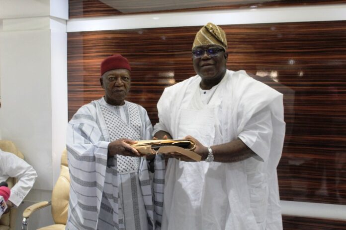 hand-over documents FCSC R-L: Incoming Chairman, Prof. Tunji Olaopa received hand-over documents from Dr. Jonah Madugu- former acting Chairman.