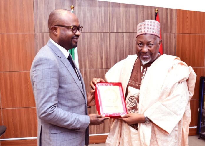 interior-1 The Minister of Defence, Muhammad Badaru Abubakar, CON presenting a plague to Minister of Interior, Hon. Olubumi Tunji Ojo when the later paid a courtesy visit to Ship House, Abuja on Tuesday, 14th November, 2023.