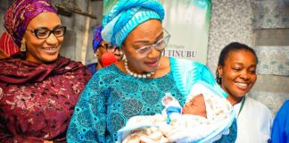 From left; Wife of Vice President Hajia Nana Shetima, First Lady of the Federal Republic of Nigeria, Senator Oluremi Tinubu, CON carrying the First Baby of the Year 2024, Baby Boluwatife Johnson, born at the National Hospital Abuja