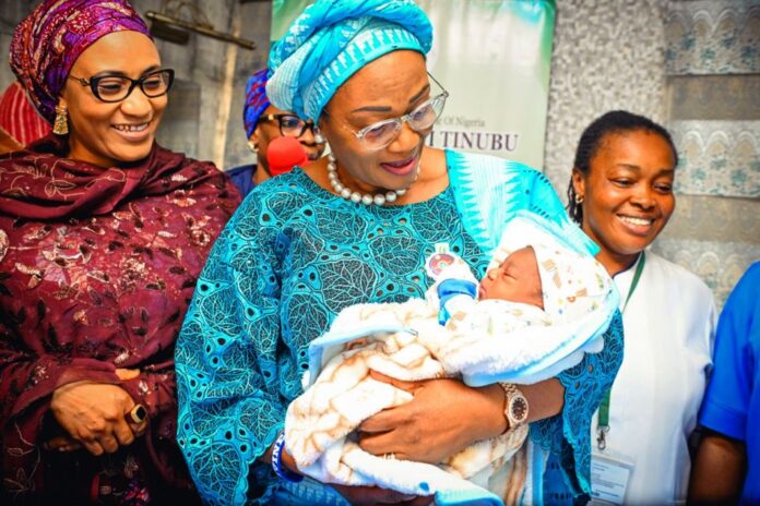 First Baby in FCT1 From left; Wife of Vice President Hajia Nana Shetima, First Lady of the Federal Republic of Nigeria, Senator Oluremi Tinubu, CON carrying the First Baby of the Year 2024, Baby Boluwatife Johnson, born at the National Hospital Abuja