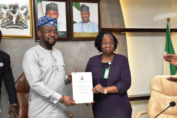The Permanent Secretary,FMAFS, Mr. Temitope Fashedemi and Director,Human Resources Management, Mrs Oluwatoyin Alade,during the Handover Ceremony in Abuja.