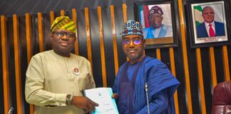The New Permanent Secretary Ministry of Housing and Urban Development, Dr. Marcus Olaniyi Ogunbiyi (L) signing /receiving the handover note from the outgoing Permanent Secretary, works and housing, Mamuda Mamman(R), during the occasion of the official handover at the Ministry Headquarters in Abuja, Friday, January12th, 2024