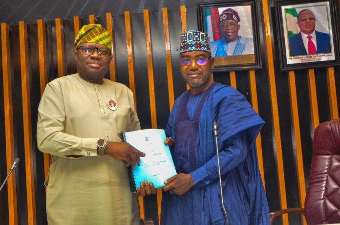 The New Permanent Secretary Ministry of Housing and Urban Development, Dr. Marcus Olaniyi Ogunbiyi (L) signing /receiving the handover note from the outgoing Permanent Secretary, works and housing, Mamuda Mamman(R), during the occasion of the official handover at the Ministry Headquarters in Abuja, Friday, January12th, 2024