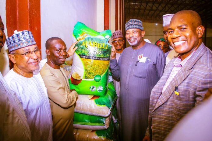 The Hon. Minister of Agriculture and Food Security, Sen. Abubakar Kyari during the Working Visit to Mabeli Rice Mill in Niger State.