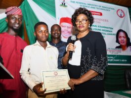 Permanent Secretary, Federal Ministry of Innovation, Science and Technology, Mrs. Esuabana Nko-Asanye representative of the Hon. Minister (right) Teacher, Unity Senior College, Lagos State, Mr. Peter Abass Tunde (left) Abdulrahman Fadlullahi a Student, from Unity Senior College, Lagos State winner 1st Position at the National Final Examination 774 Young Nigerian Scientists Presidential Award (774-YONSPA) 8th edition and others during the Presentation of Certificates in Abuja recently.