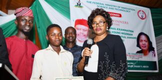 Permanent Secretary, Federal Ministry of Innovation, Science and Technology, Mrs. Esuabana Nko-Asanye representative of the Hon. Minister (right) Teacher, Unity Senior College, Lagos State, Mr. Peter Abass Tunde (left) Abdulrahman Fadlullahi a Student, from Unity Senior College, Lagos State winner 1st Position at the National Final Examination 774 Young Nigerian Scientists Presidential Award (774-YONSPA) 8th edition and others during the Presentation of Certificates in Abuja recently.