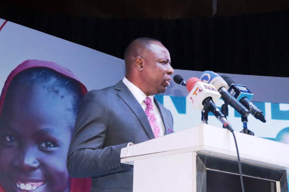 Permanent Secretary, Federal Ministry of Women Affairs, Ambassador Gabriel Aduda delivering his welcome address at the National Dialogue on Ending Child Marriage in Nigeria