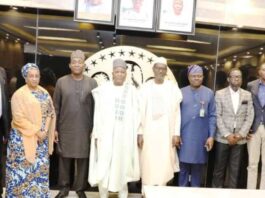 5th from Right, Arc. Ahmed Musa Dangiwa, Minister of Housing and Urban Development; 4th from Left, Engr. Abdullahi Tijjani Gwarzo, Minister of State, Housing and Urban Development; 4th from Right, Dr. Marcus Olaniyi Ogunbiyi; 3rd from Left, Rabiu Umar, Group Chief Commercial Officer for Dangote Industries Limited; 2nd from Right, Gbenga Onimowo, Commercial Director for Lafarge Cement PLC; 1st Right, James Salako, Secretary, Cement Manufacturers Association of Nigeria (CMAN); and other representatives of Cement Manufacturers at a Meeting to tackle the incessant hike in price of cement, convened by the Minister in Abuja on Tuesday 20th Feb, 2024.
