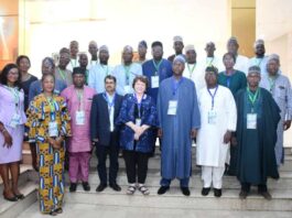 Group Photograph of the Representative of the Honourable Minister, Development Partners and other participants at the National Workshop