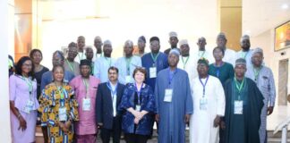 Group Photograph of the Representative of the Honourable Minister, Development Partners and other participants at the National Workshop