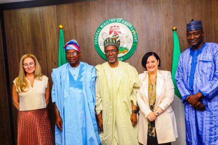 EU's working visit3 Centre, Hon Minister of Environment, Balarabe Abbas Lawal flanked to his right by the Minister of State, Dr Iziaq Adekunle Adeboye Salako and to his left by the Leader of of the delegation European Union (EU), Ambassador Samuela Isopi during the EU's working visit to the Federal Ministry of Environment, Mabushi Abuja. Right is the Permanent Secretary, Federal Ministry of Environment, Mahmud Adam Kambari at the event