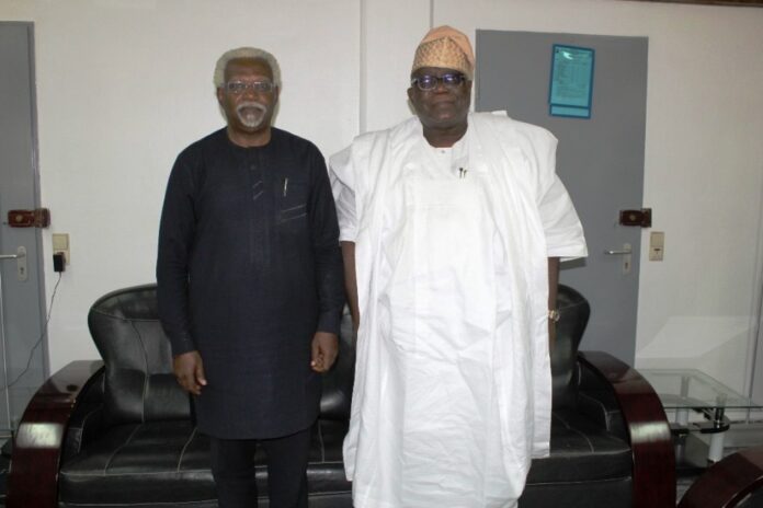 Ekpo Nta, Esq visit Civil Service Comm. Above Picture: Chairman, Federal Civil Service Commission (FCSC), Prof. Tunji Olaopa (Right) with the Chairman and Chief Executive of National Salaries, Incomes and Wages Commission (NSIWC); Ekpo Nta, Esq. (Left) during the visit of the former to the latter office on Friday.