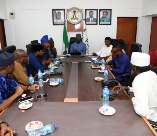 Honourable Minister of State for Youth Development, Ayodele Olawande with Forum of States Commissioners of Youth and Sports Development in a meeting in Federal Ministry of Youth Development, Abuja