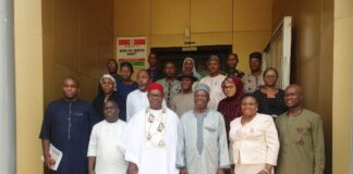 Group photograph. Center Dep Gov of Delta State Sir Monday John Onyeme, DG National Boundary Commission Surv. Adamu Adaji, Perm Sec. Ministry of Lands & Survey Mrs. Gladys Aghogho Puegeren
