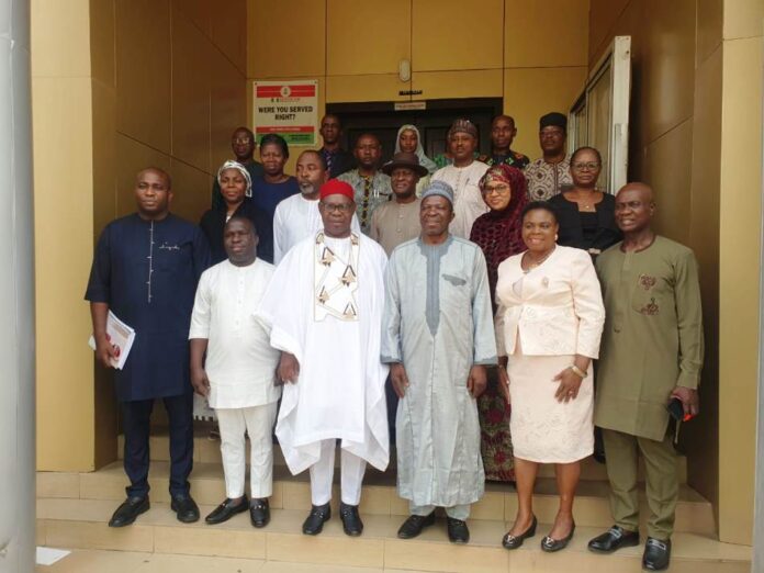 Group photograph Group photograph. Center Dep Gov of Delta State Sir Monday John Onyeme, DG National Boundary Commission Surv. Adamu Adaji, Perm Sec. Ministry of Lands & Survey Mrs. Gladys Aghogho Puegeren