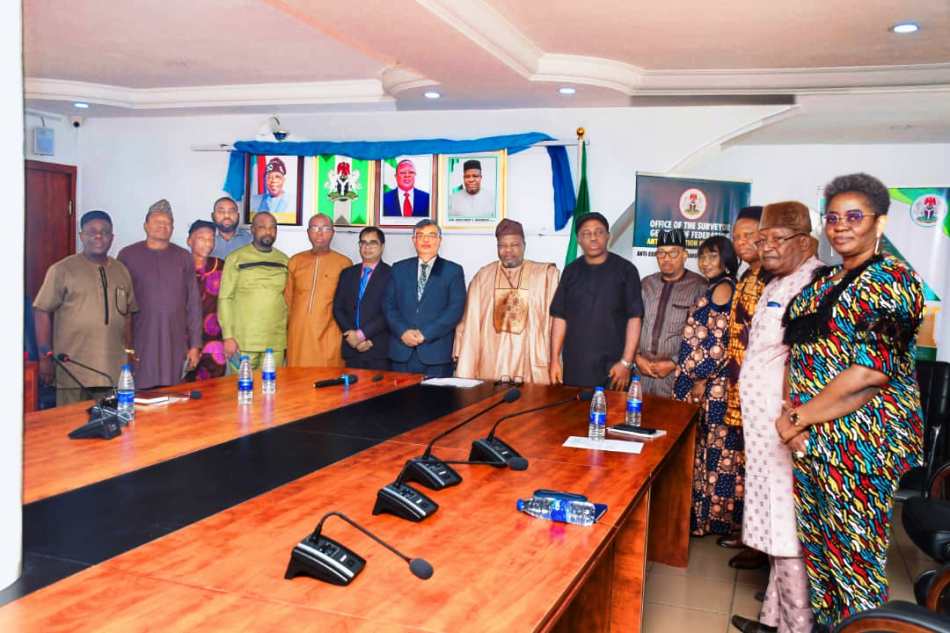 FROM MIDDLE: SGOF, Surv. Abuduganiyu Adebomehin mnis, fce, with Indian delegation headed by the High Commissioner to Nigeria, Ambassador Shri G.Balasubramanian in a group photograph with OSGOF management staff in Abuja