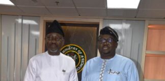 Honourable Minister of State Petroleum Resources (Gas) Rt. Honourable Ekperikpe Ekpo (left) receiving the Honourable Minister of Power, Chief Adebayo Adelabu in his office in Abuja.