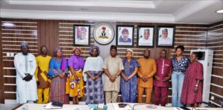5th Left:Dr Mary Ogbe, Permanent Secretary Ministry of Solid Minerals Development/Steel Development; On her Left: Mr Ime Ekrikpo, Director Investment Promotion and Minerals Trade Department; On his Left: Mrs Oluwayemisi Ajayi Special Assistant Special Projects to Hon. Minister; 2nd Right: Technical Asst. To Hon. Minister, Mrs. Nancy Chinemerem Nwaka; and other members of the Committe for The Establishment of the Nigerian Mining Centre of Excellence CoE.