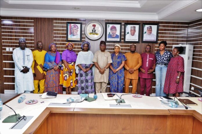 Mining Centre of Excellence 5th Left:Dr Mary Ogbe, Permanent Secretary Ministry of Solid Minerals Development/Steel Development; On her Left: Mr Ime Ekrikpo, Director Investment Promotion and Minerals Trade Department; On his Left: Mrs Oluwayemisi Ajayi Special Assistant Special Projects to Hon. Minister; 2nd Right: Technical Asst. To Hon. Minister, Mrs. Nancy Chinemerem Nwaka; and other members of the Committe for The Establishment of the Nigerian Mining Centre of Excellence CoE.