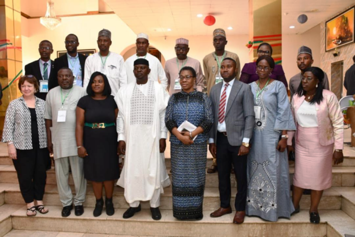 National Workshop on Safely Managed Sanitation1 he Honourable Minister, Federal Ministry of Water Resources and Sanitation, Engr.Prof. Joseph Terlumun Utsev, FNSE, FNIWE,FNICE,(R), the Director, Water Quality Control and Sanitation, Mrs Elizabeth Ugoh (L) during the Opening of the National Workshop on Safely Managed Sanitation