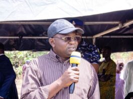 The Honourable Minister of Water Resources and Sanitation, Engr. Prof. Joseph Terlumun Utsev presenting his address during the commissioning ceremony