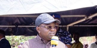 The Honourable Minister of Water Resources and Sanitation, Engr. Prof. Joseph Terlumun Utsev presenting his address during the commissioning ceremony