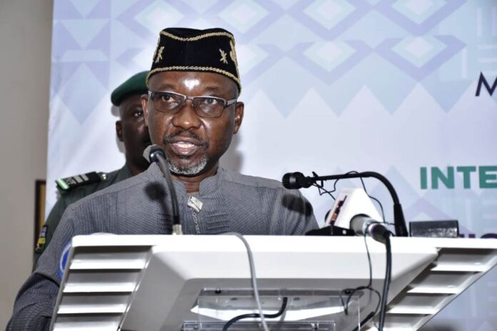 Honourable Minister of State Petroleum Resources (Gas) Rt. Hon. Ekperikpe Ekpo delivering his address during the Internal Stakeholders' Workshop in Abuja.