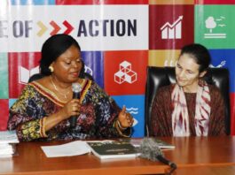 On the left is the Senior Special Assistant to the president on SDGs, Princess Adejoke Orelope-Adefulire, explaining some implementation solution plans documents to the Global Director, Oxford Poverty and Human Development Initiative, Professor Sabina Alkire.