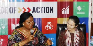 On the left is the Senior Special Assistant to the president on SDGs, Princess Adejoke Orelope-Adefulire, explaining some implementation solution plans documents to the Global Director, Oxford Poverty and Human Development Initiative, Professor Sabina Alkire.
