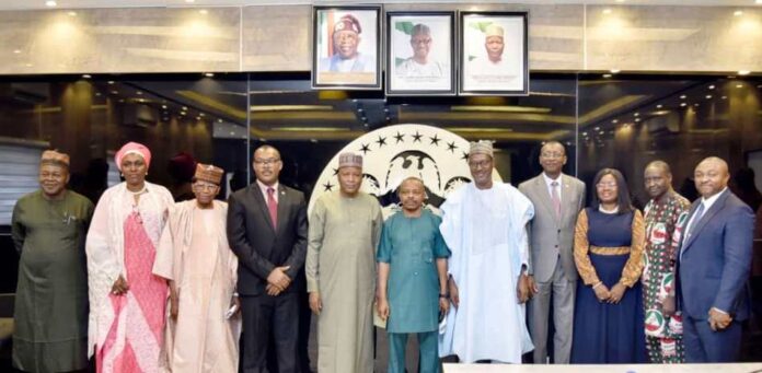 courtesy visit Hon Minister Arc Ahmed Musa Dangiwa in a group photograph with the representatives of FMBN , NLC, TUC& NECA during their courtesy visit, Thursday, February 15th, 2024