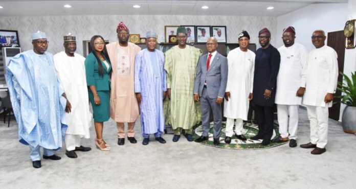 group photograph with the New Executive Management of FMBN Housing Minister, Arc Ahmed Dangiwa in a group photograph with the New Executive Management of FMBN and FHA, Thursday, February 22nd, 2024